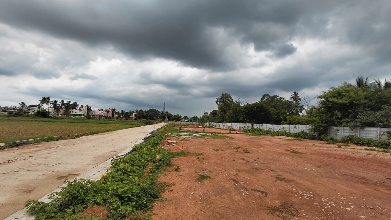 KND Green Gardenia — concrete roads with compound wall boundary